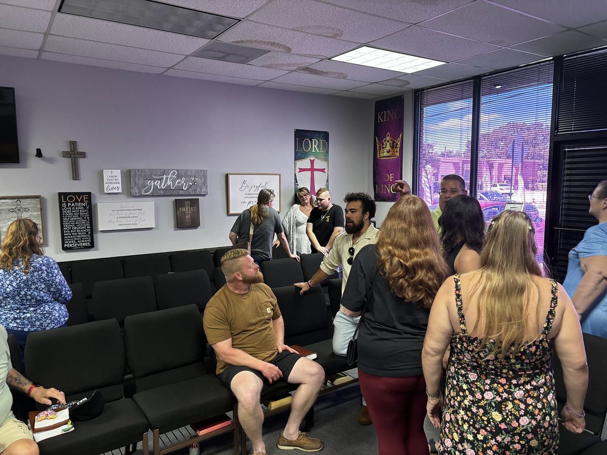 King of Kings members gathered together in fellowship