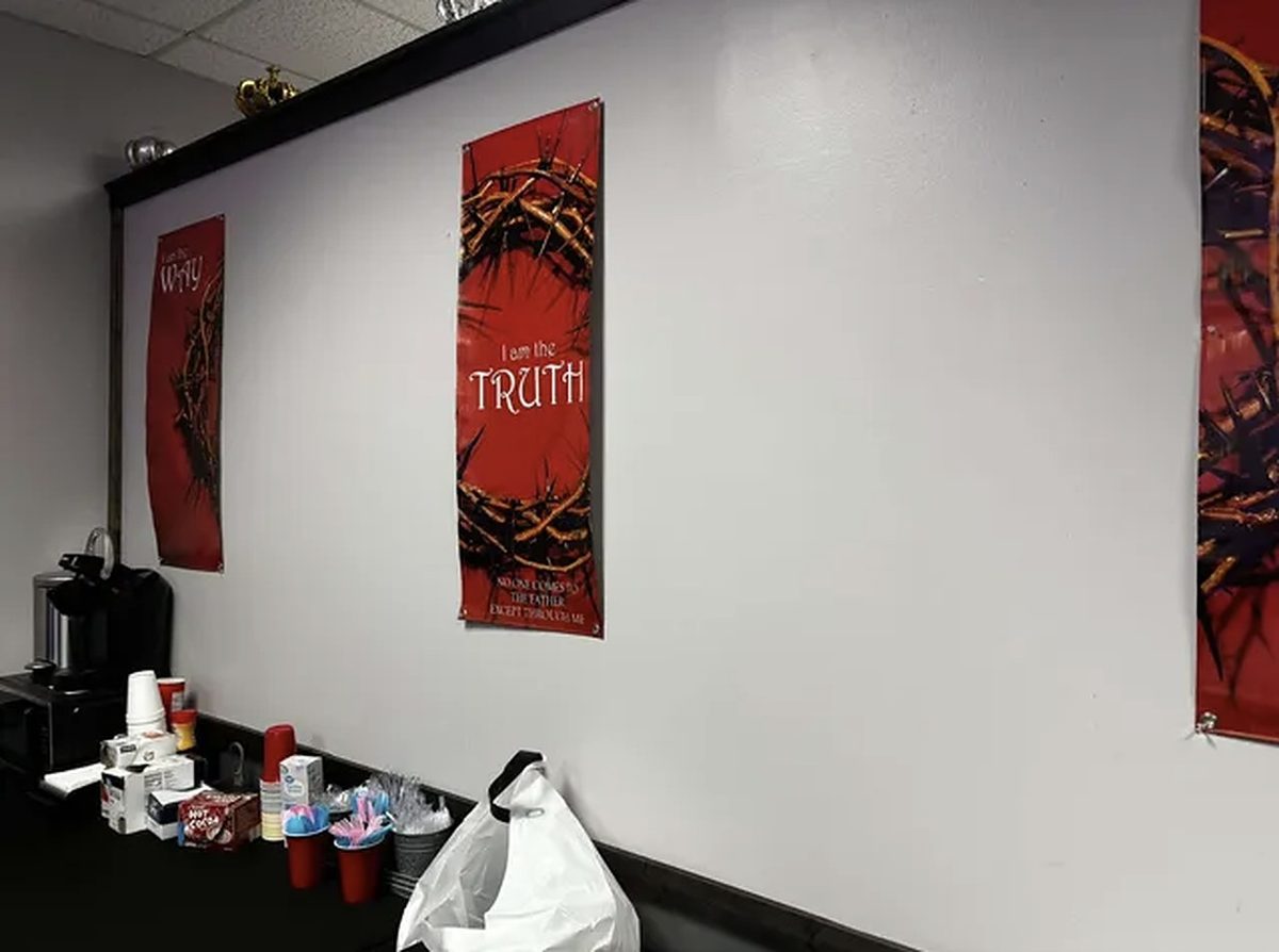 Red banners reading the Way, the Truth, and the Life