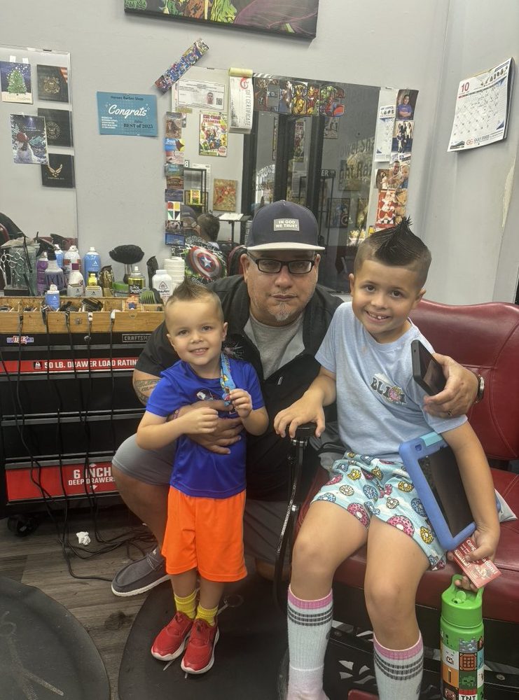 Pastor Eric with two of the children
